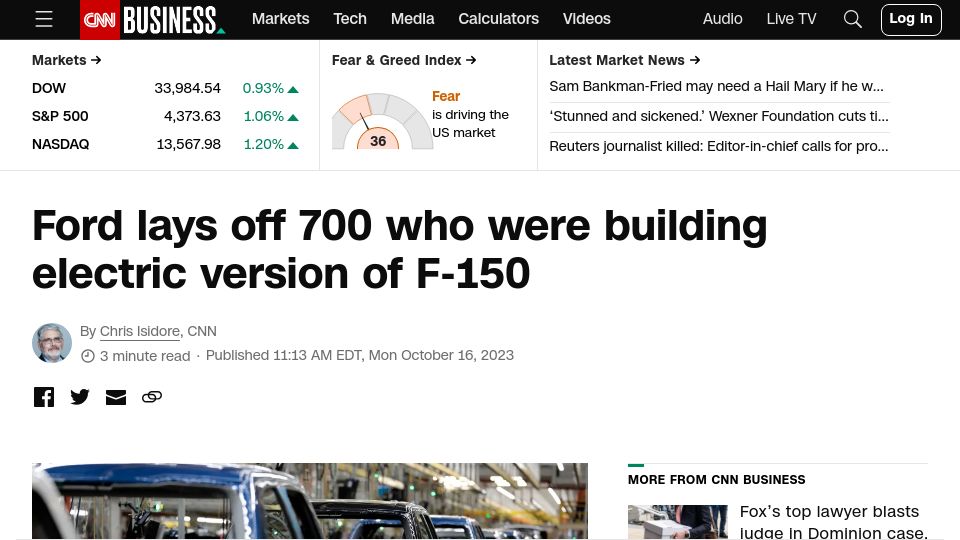 Screenshot of cnn.com: Ford lays off 700 who were building electric version of F-150