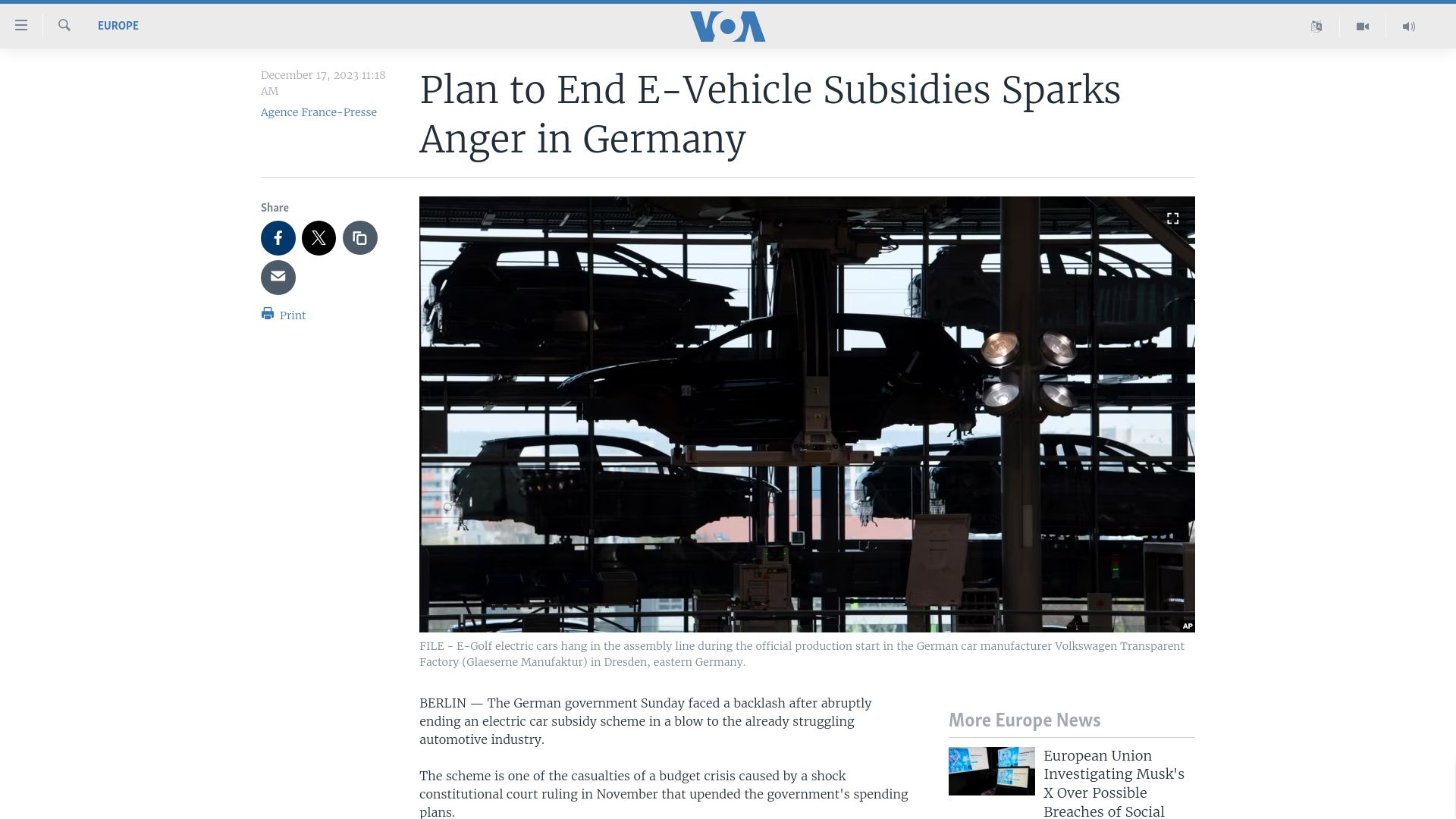 Screenshot of voanews.com: Plan to End E-Vehicle Subsidies Sparks Anger in Germany