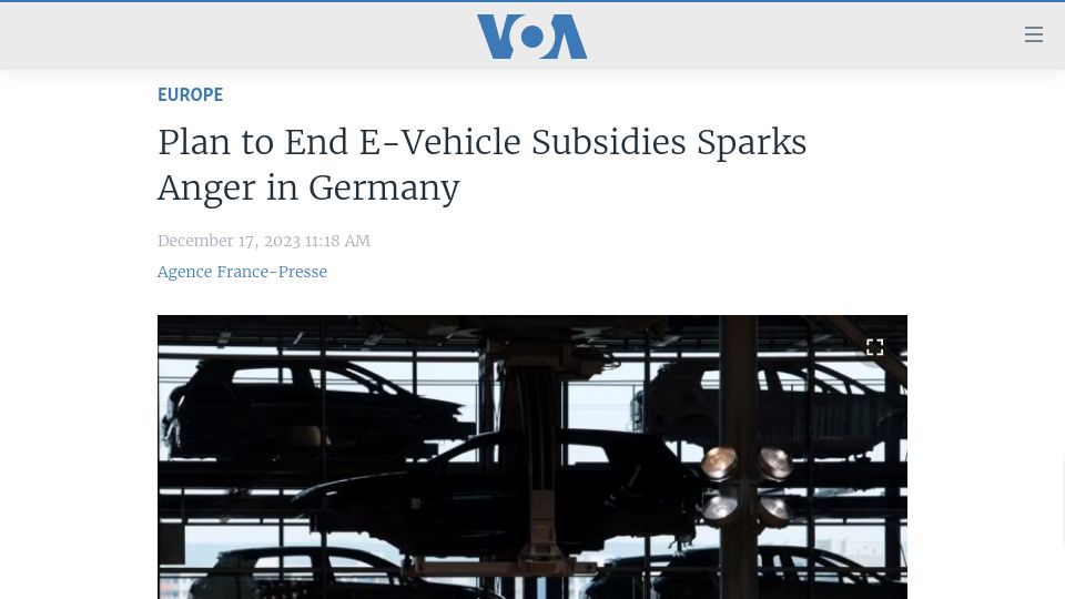 Screenshot of voanews.com: Plan to End E-Vehicle Subsidies Sparks Anger in Germany