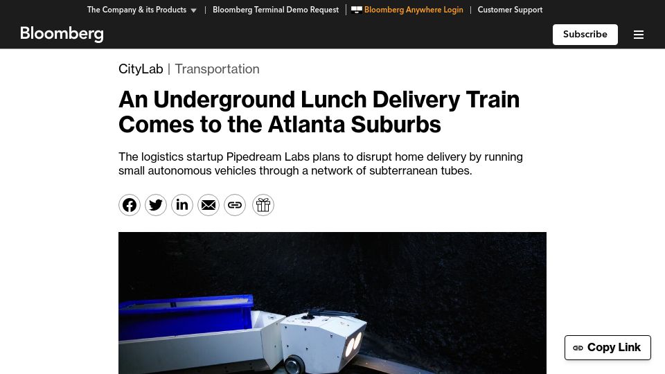 Screenshot of bloomberg.com: An underground delivery train comes to the Atlanta suburbs