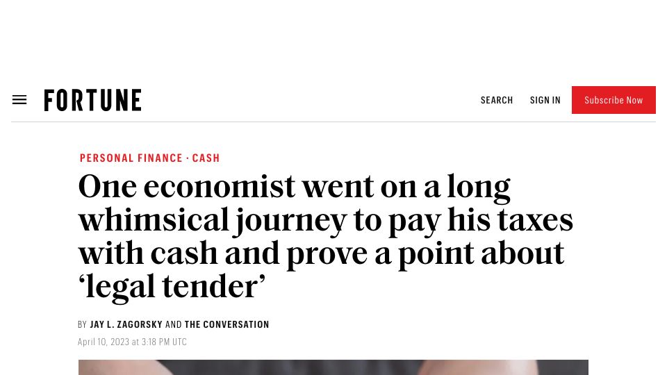 Screenshot of fortune.com: One economist went on a long whimsical journey to pay his taxes with cash