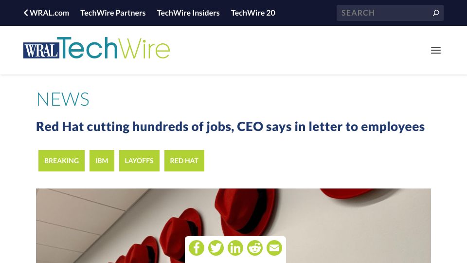 Screenshot of wraltechwire.com: Red Hat cutting hundreds of jobs, CEO says in letter to employees