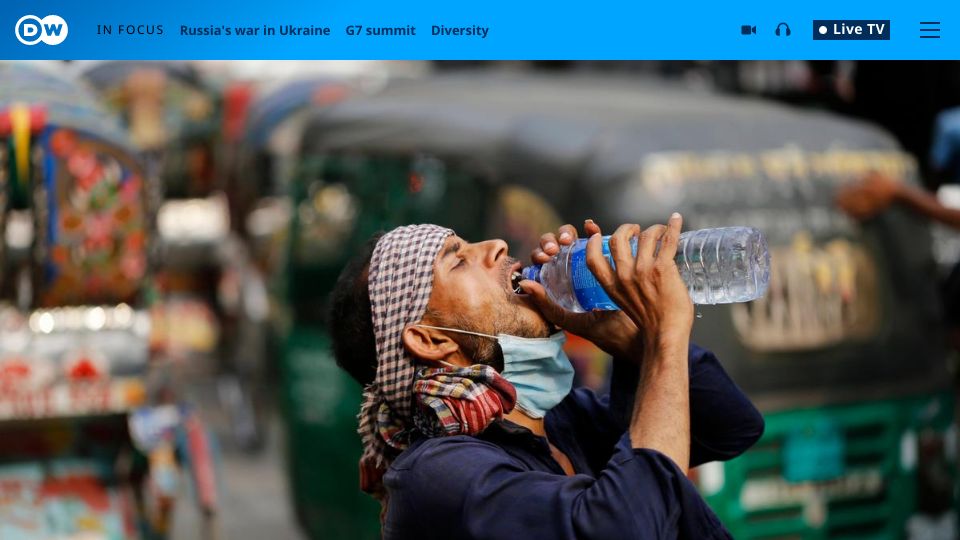 Screenshot of dw.com: A temperature rise of 2 degrees Celsius impacts billions