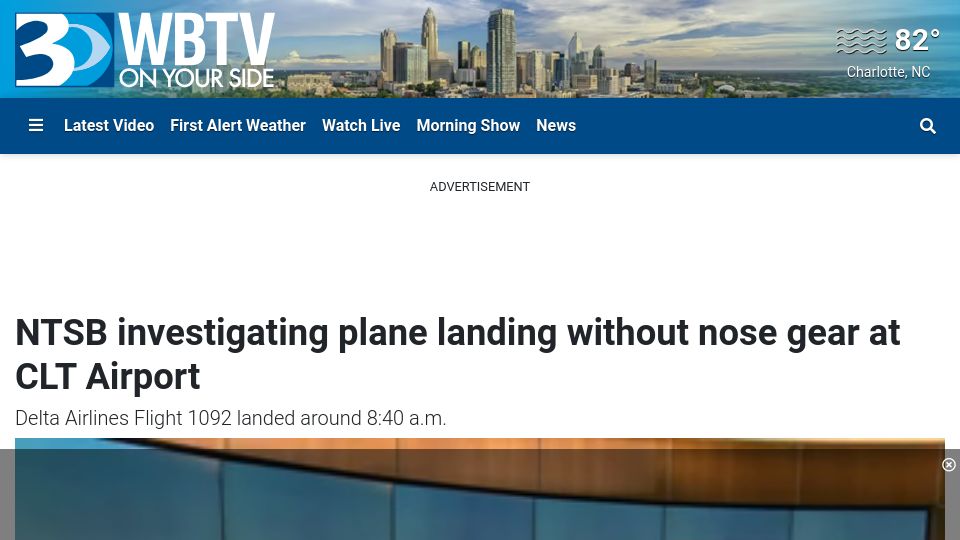 Screenshot of wbtv.com: Delta flight lands in Charlotte without front landing gear