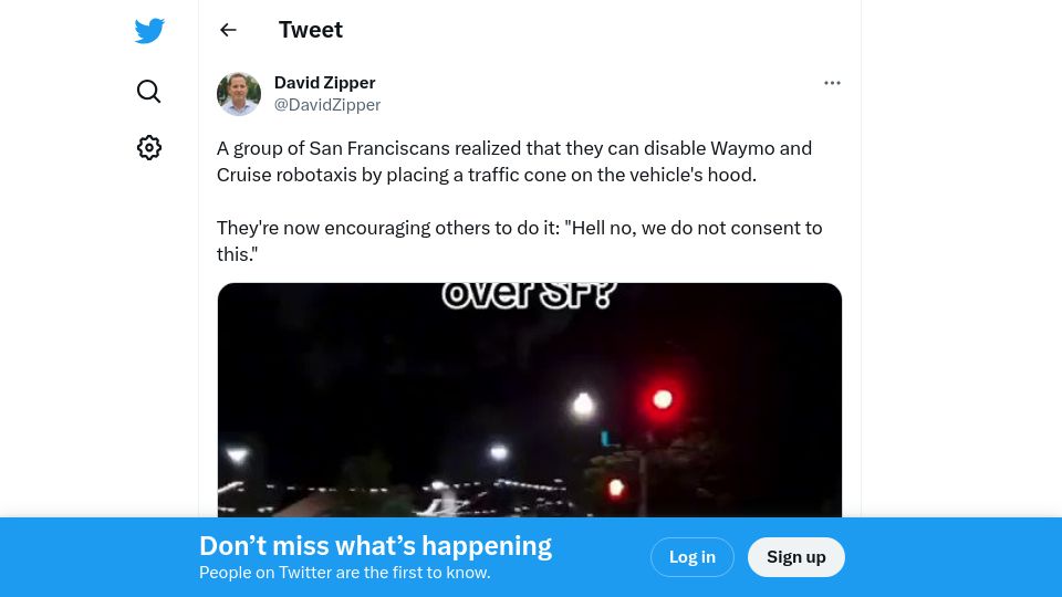 Screenshot of twitter.com: San Franciscans disable robotaxis by placing a traffic cone on the hood