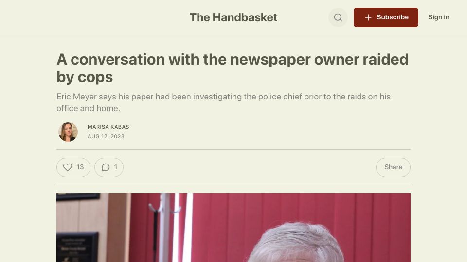 Screenshot of thehandbasket.substack.com: A conversation with a newspaper owner raided by cops