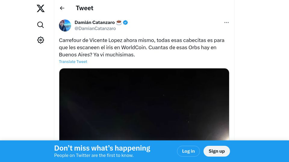 Screenshot of twitter.com: People lining up in Argentina to have their iris scanned for Worldcoin