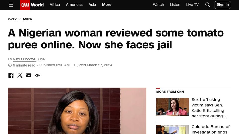 Screenshot of cnn.com: A Nigerian woman reviewed some tomato puree online. Now she faces jail