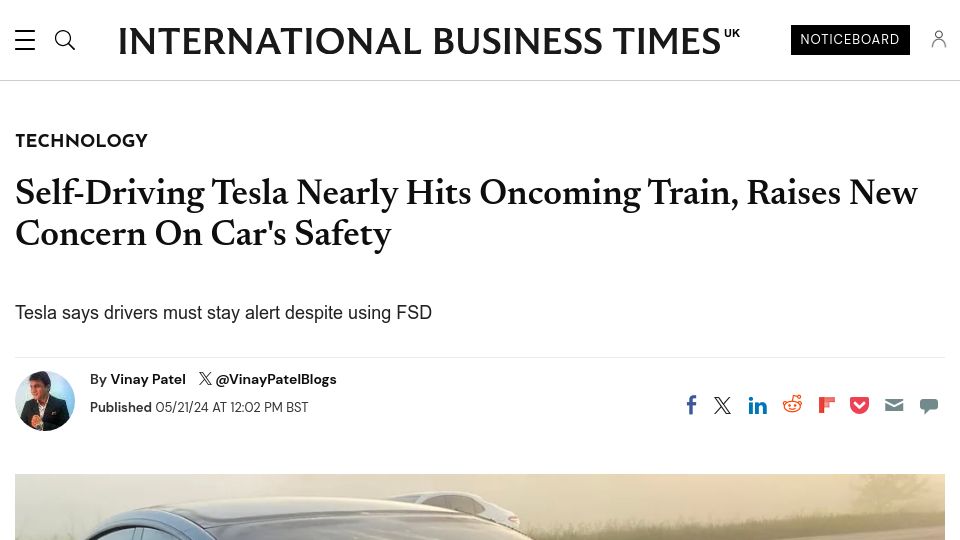 Screenshot of ibtimes.co.uk: Self-Driving Tesla Nearly Hits Oncoming Train