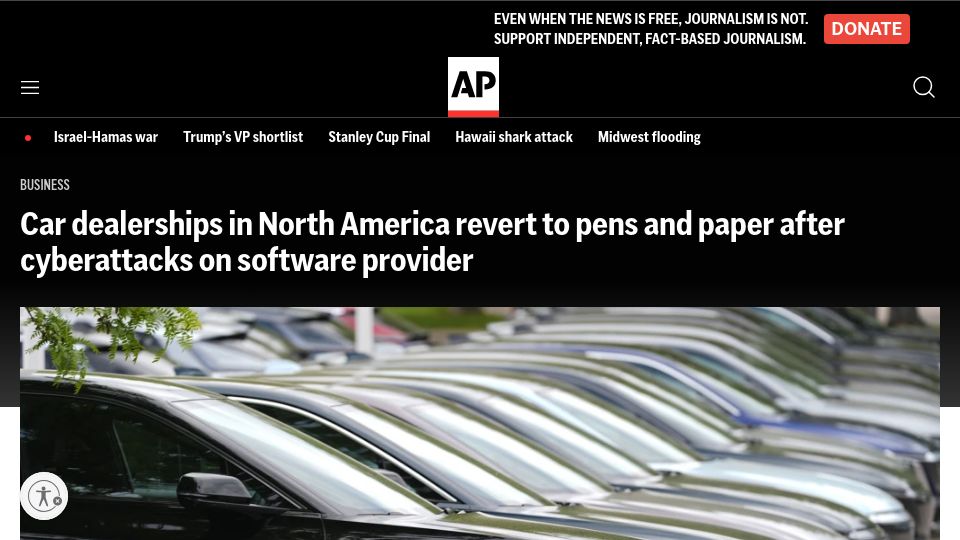 Screenshot of apnews.com: Car dealerships revert to pens and paper after cyberattacks on software provider