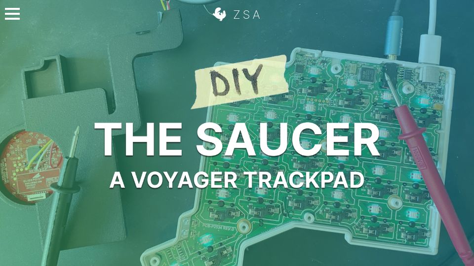 Screenshot of blog.zsa.io: The Saucer – A DIY trackpad attachment for the Voyager