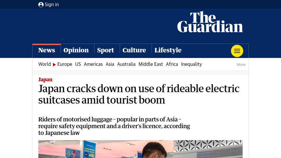 Screenshot of theguardian.com: Japan cracks down on use of rideable electric suitcases amid tourist boom
