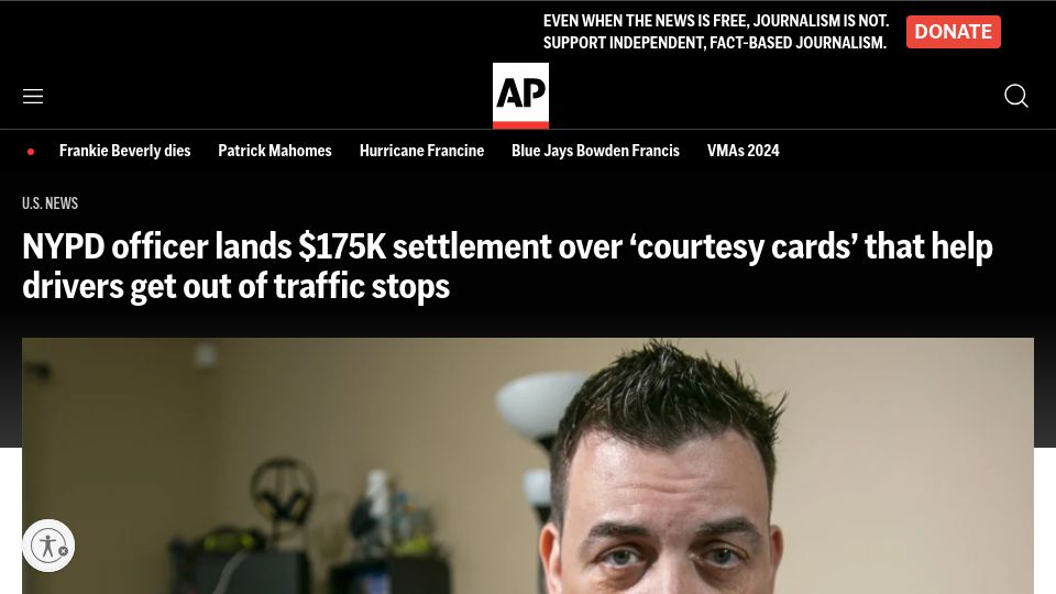 Screenshot of apnews.com: Officer who ignored NYPD's 'courtesy cards' receives $175K settlement