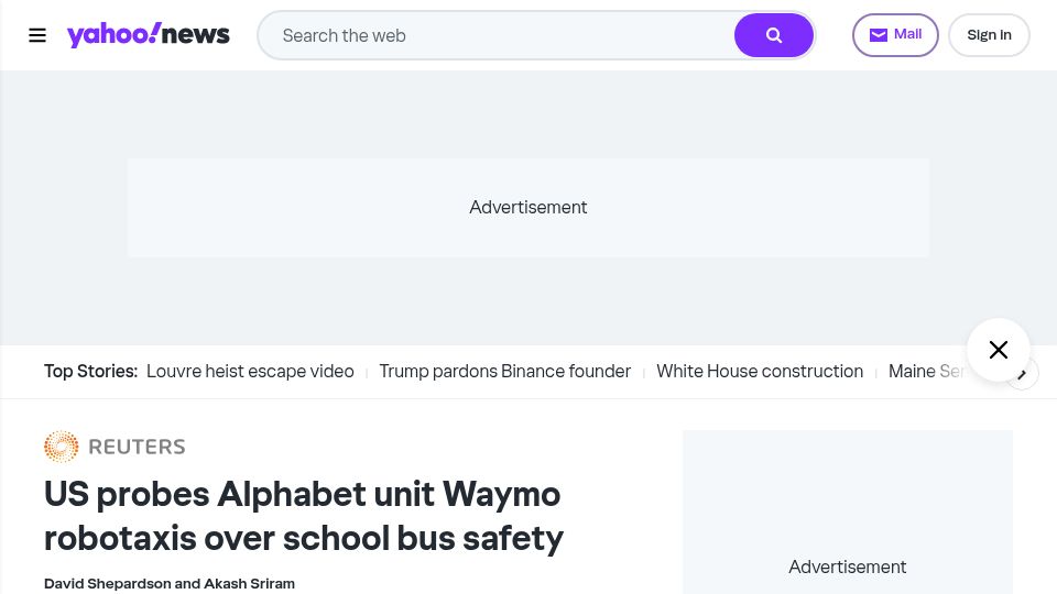 Screenshot of yahoo.com: US probes Waymo robotaxis over school bus safety