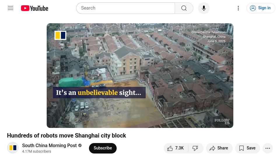 Screenshot of youtube.com: Robots move Shanghai city block [video]