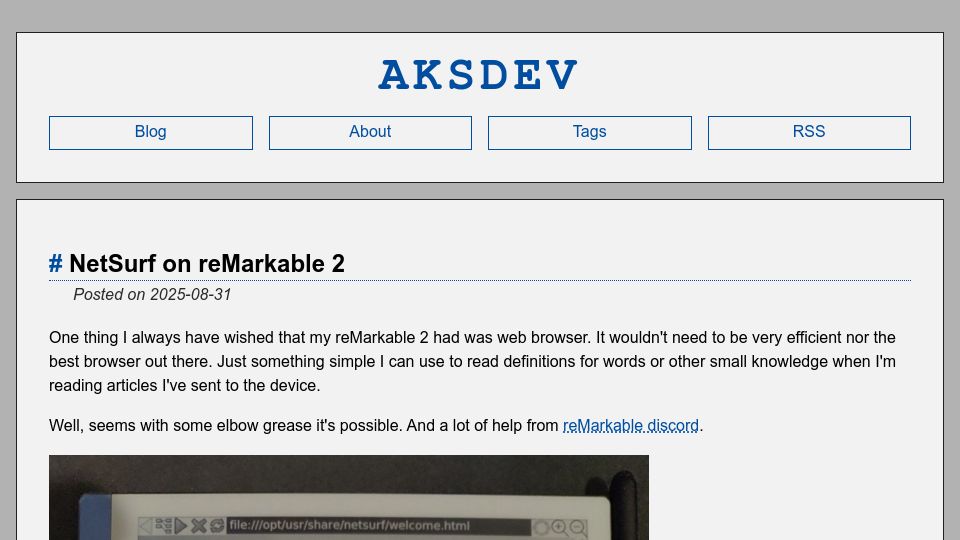 Screenshot of akselmo.dev: NetSurf on ReMarkable 2