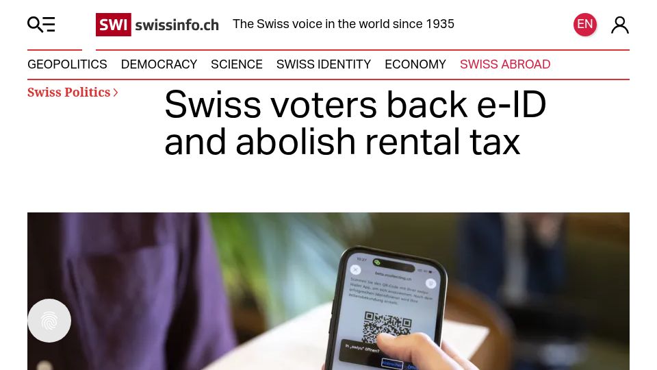 Screenshot of swissinfo.ch: Swiss voters back e-ID and abolish rental tax