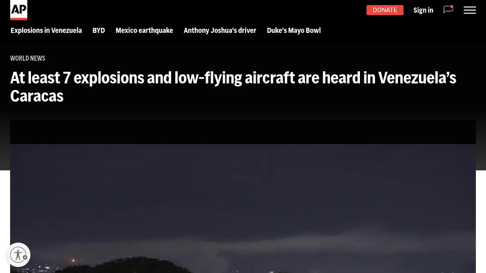 Screenshot of apnews.com: At least 7 explosions and low-flying aircraft are heard in Venezuela's Caracas