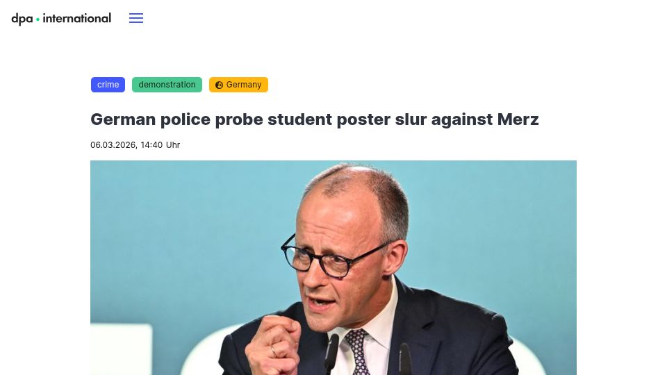 Screenshot of dpa-international.com: German police probe student poster slur (Lick my balls Merz) against Merz